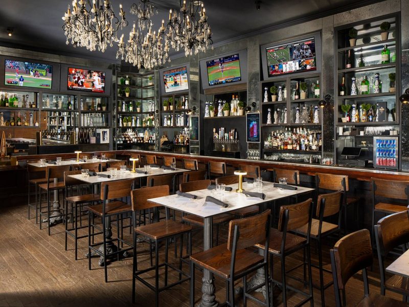 The main bar with screens across the back wall