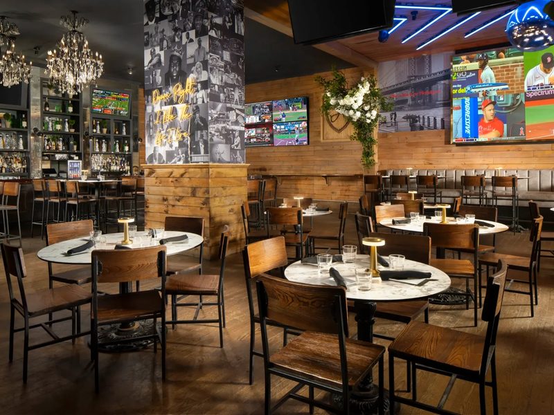 The Ainsworth Midtown dining room with every screen live